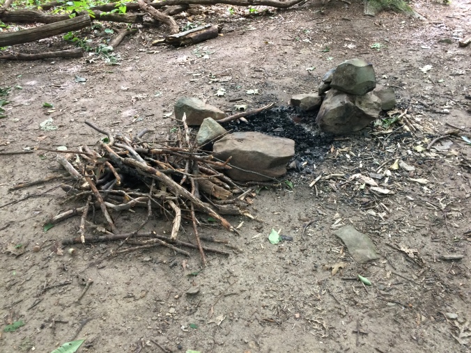 Found this illegal fire ring at an informal campsite on my section.  Since destroying the last one early this spring, no one had rebuilt it until now.